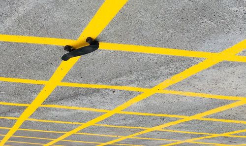 High angle view of yellow zebra crossing on road
