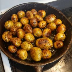 Close-up of potatoes in frying pan