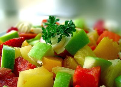 Close-up of chopped fruits in plate