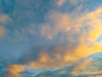 Low angle view of dramatic sky during sunset