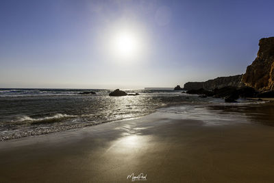 Scenic view of sea against clear sky