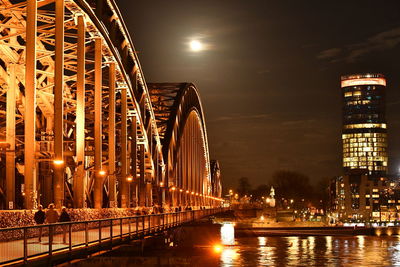 View of illuminated bridge at night