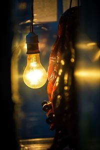 Close-up of illuminated light bulb