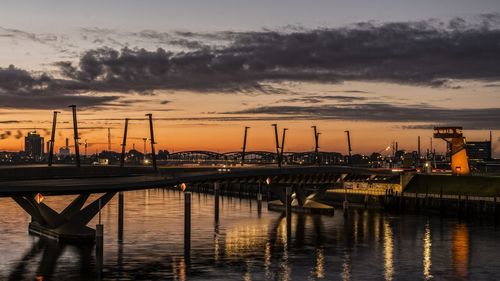 Bridge over elbe river during sunset