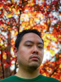 Portrait of young man looking away