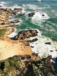 High angle view of rocks in sea