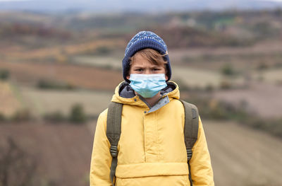 Portrait of man wearing mask