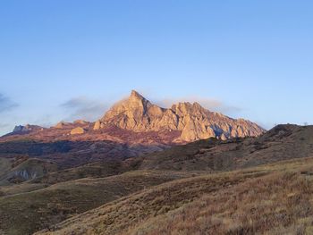 Scenic view of rocky mountains against sky