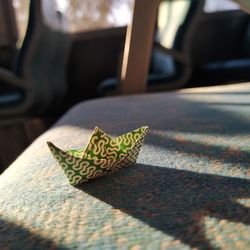 Close-up of butterfly on car