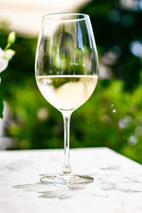 Close-up of wine glass on table