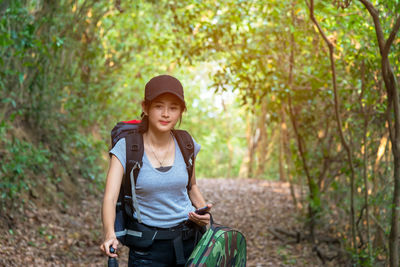 Portrait of a young man in forest