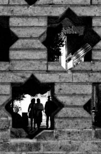 Woman in front of building