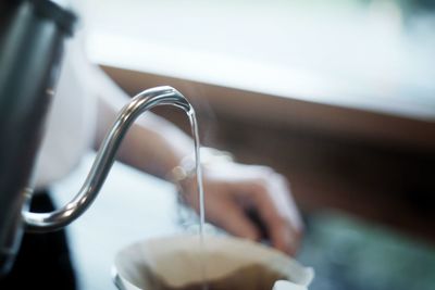 Close-up of woman holding cigarette