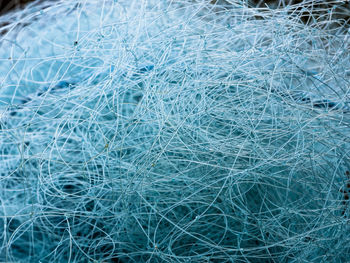 Full frame shot of blue fishing net