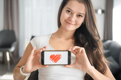 Young woman using mobile phone