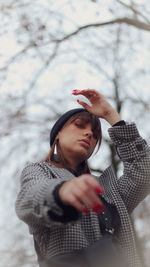 Portrait of woman wearing hat