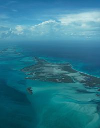 Aerial view of landscape and sea against sky