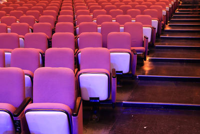 High angle view of empty chairs in auditorium