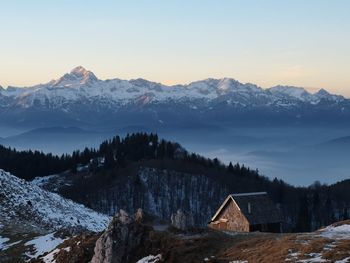 Scenic view of snowcapped mountains against sky