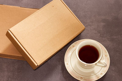 High angle view of coffee cup on table