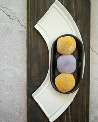 High angle view of mochi dessert in plate on table