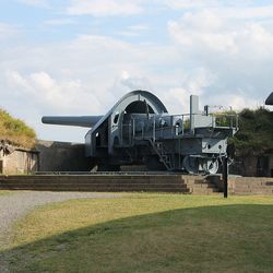 Train on field against sky