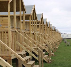 View of beach huts against sky