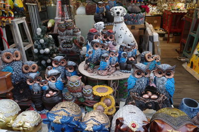 Statues in market stall for sale