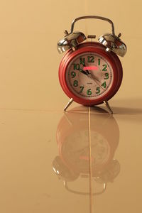 Close-up of clock on wall