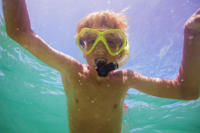 Man swimming in sea