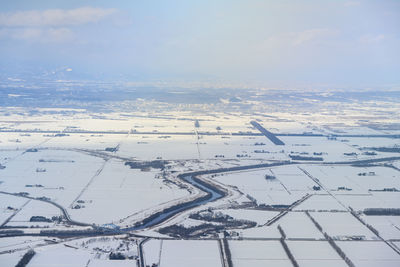 Aerial view of cityscape against sky