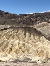 Scenic view of desert against clear sky