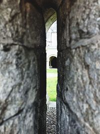 Built structure by stone wall