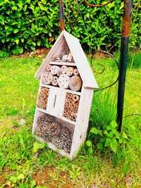 High angle view of birdhouse on field