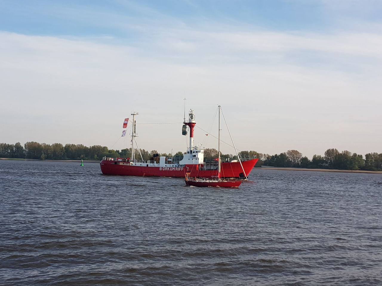 SHIP MOORED AT HARBOR