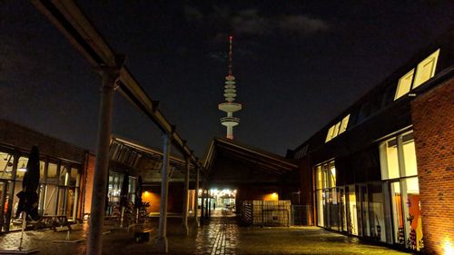 Illuminated buildings in city at night