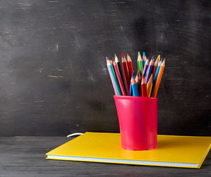 Multi colored pencils on table