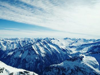 Scenic view of snow covered mountains