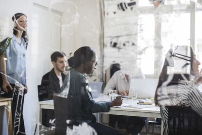 Multi-ethnic entrepreneurs in board room during business meeting