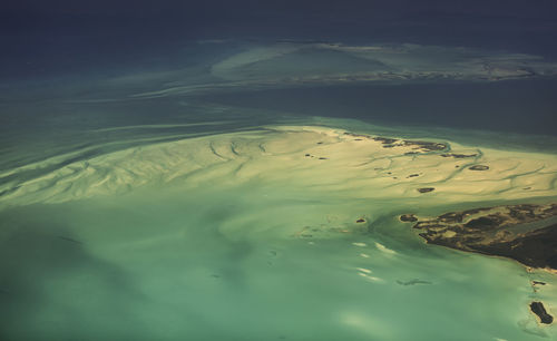 High angle view of sea shore against sky