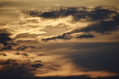 Low angle view of dramatic sky during sunset