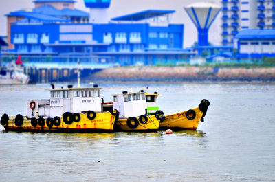 View of yellow boat in sea