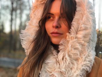 Portrait of beautiful young woman in winter