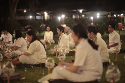 A number of people attend a meditation class in borobudur temple, magelang, central java