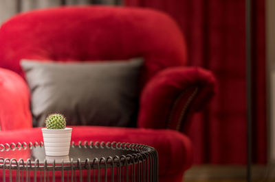 Close-up of red curtain at home