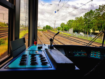 Railroad tracks seen through train window