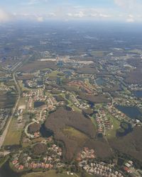 High angle view of buildings in city against sky