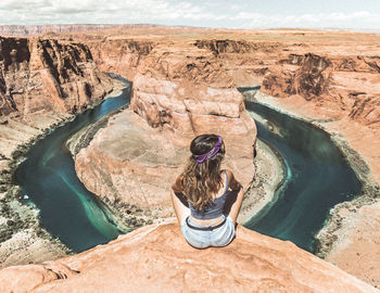 Rear view of woman at horseshoe bend