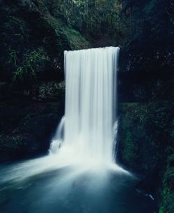 View of waterfall in forest