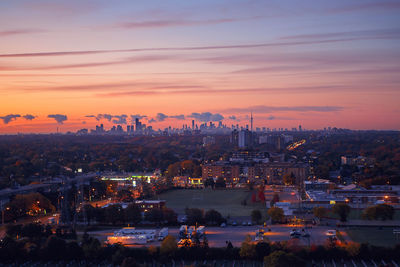 Aerial view of cityscape during sunset